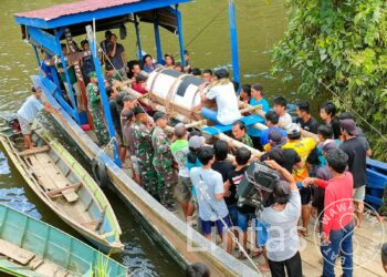 Wujudkan Kepedulian Terhadap Rakyat, Satgas Pamtas RI-Malaysia Yon Armed 5/105 Tarik/PG Bantu Proses Pemakaman Warga Masyarakat di Perbatasan