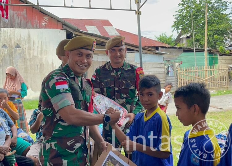 Satgas Organik Maluku Utara Yon Arhanud 3/YBY Bakti Sosial Pemberian Seragam Sekolah, Alat Tulis dan Pengobatan Gratis Dalam Rangka Hari Pahlawan