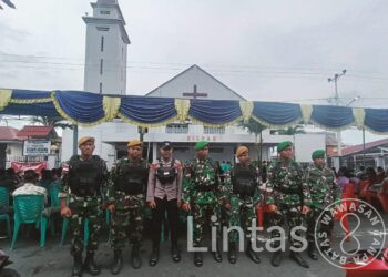 Satgas Satuan Organik Yonarhanud 3/Yby Bersama Polri Amankan Umat Kristiani Beribadah dan Rayakan Natal