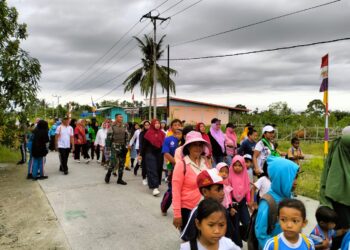 Bersinergi Dengan Masyarakat, Satgas Pamtas Yonif 132/BS Ikut Memperingati HUT Kp.Sanggaria