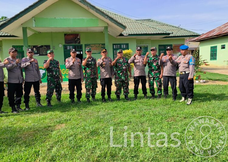 Tingkatkan Sinergitas TNI-Polri, Personil Koramil 18/Bda Dan Polsek Banda Alam Gelar Apel Di Sertai Patroli Bersama