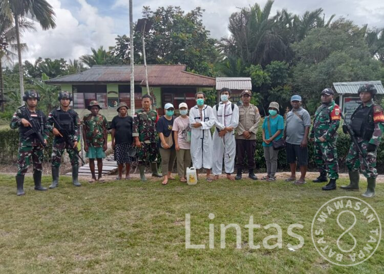 Satgas Pamtas Yonif 310/KK Dampingi Puskesmas Dalam Rangka Menekan Angka Malaria di Batom