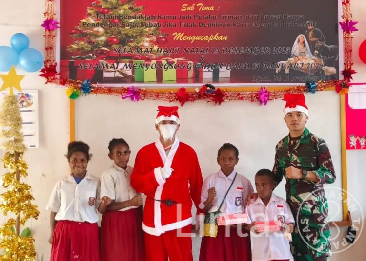 Sambut Hari Kelahiran Yesus Kristus, Satgas Yonif 721/Mks Laksanakan Ibadah Bersama Siswa-Siswi SD Yimu Igari
