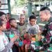 Senyum Keceriaan Dan Tingkatkan Gizi Anak-Anak Papua, Satgas Yonif 310/KK Nikmati Susu Bersama
