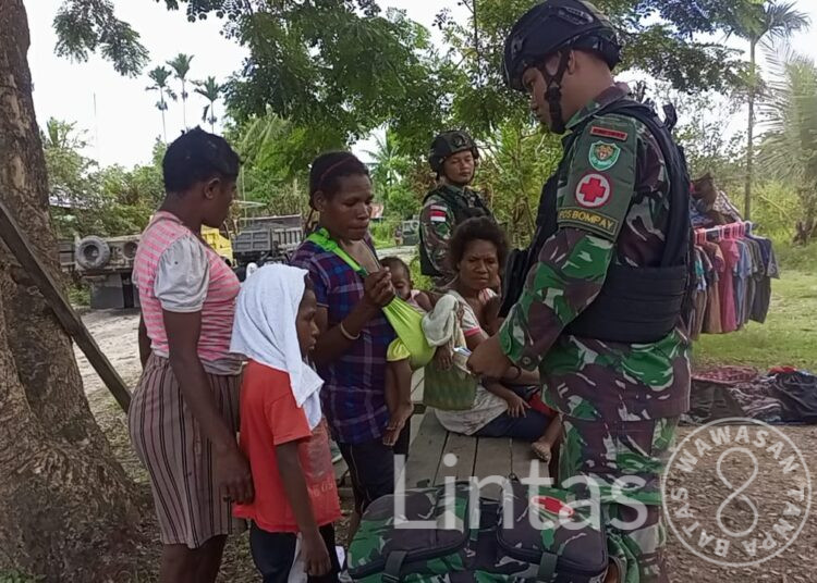 Pastikan Kondisi Warga di Awal Tahun, Satgas Yonif 310/KK Berikan Pelayanan Kesehatan