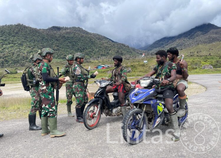 Minggu Kasih, Ksatria Buaya Putih Bagikan Berbagi Makanan