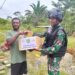 Berbagi Adalah Hal Terbaik Dalam Hidup, Satgas Yonif 310/KK Berikan Puluhan Paket Sembako di Perbatasan