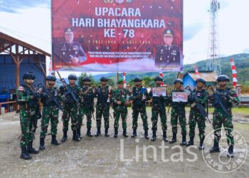 Satgas Yonif 721/Mks Turut Ramaikan HUT Bhayangkara Ke-78 Dengan Ikut Serta Dalam Pertandingan Olahraga