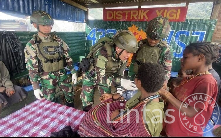 Satgas TNI Bangkitkan Semangat Anak-Anak Yigi Dalam Peringatan Hari Anak Nasional