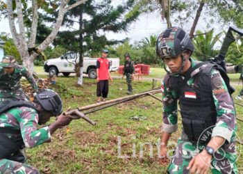 Misa Akbar Hampir Tiba, Satgas Yonif 310/KK Bersama Warga Antusias Menyambutnya