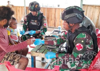 Bakti Kesehatan, Satgas Yonif 310/KK Gelar Posyandu di Perbatasan