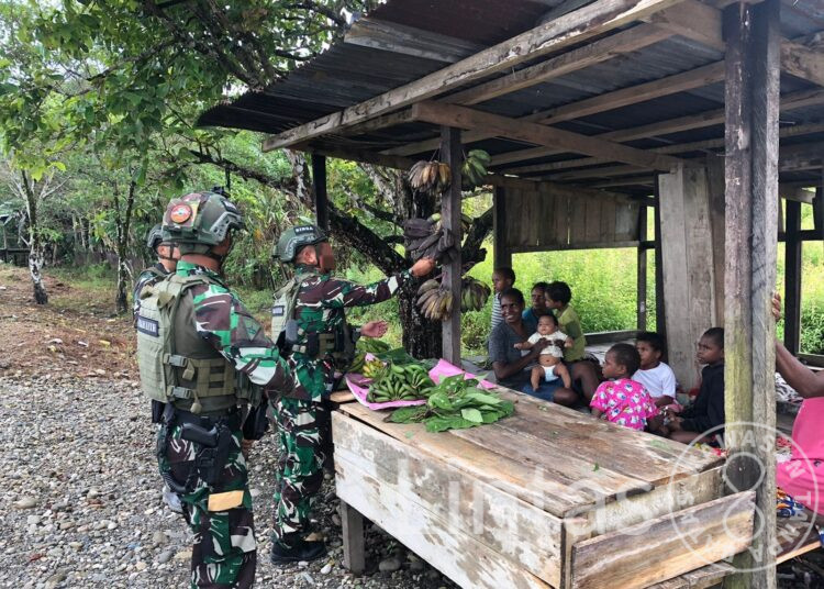 Program Rosita Satgas Marinir Disambut Gembira Warga Muara