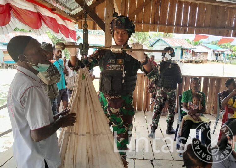 Pelayanan Kesehatan Harus Mendapatkan Perhatian Khusus, Satgas Yonif 310/KK Gelar Posyandu