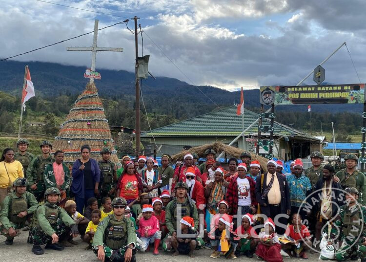Prajurit Buaya Putih Kostrad Ibadah Natal Bersama Masyarakat Kampung Wako