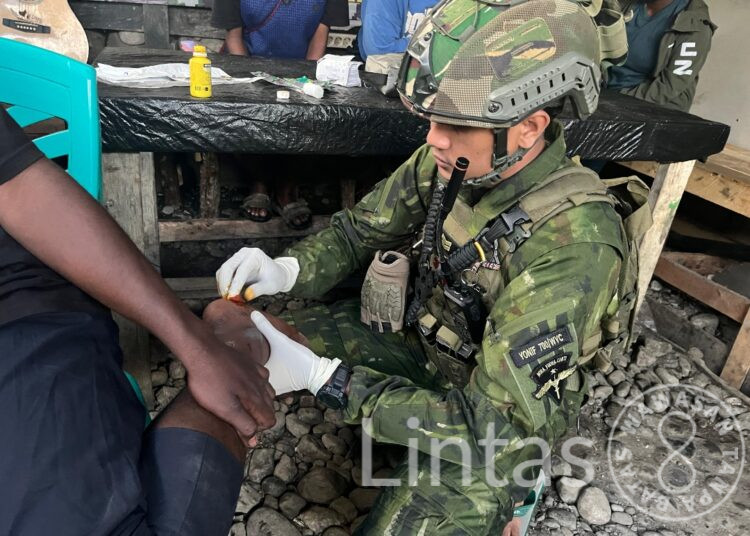 Satgas Yonif 700/WYC Layani Kesehatan Gratis untuk Siswa SMA Negeri 1 Ilaga
