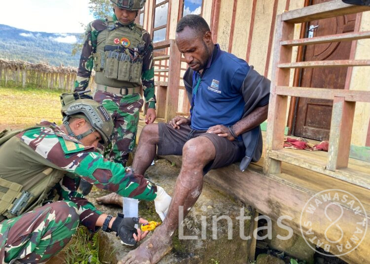 Jejak Kepedulian Satgas Yonif 700/WYC di Tanah Gome, Laksanakan Pelayanan Kesehatan Gratis