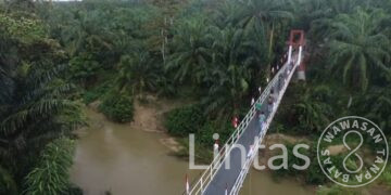 Satgas Gulbencal Kodam I/BB Rampungkan Rehabilitasi Jembatan Gantung di Halongonan Paluta
