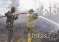 TIM SATGAS KARHUTLA KODAM XXII/TAMBUN BUNGAI TERUS LAKUKAN PENDINGINAN DI HIU PUTIH JEKAN RAYA