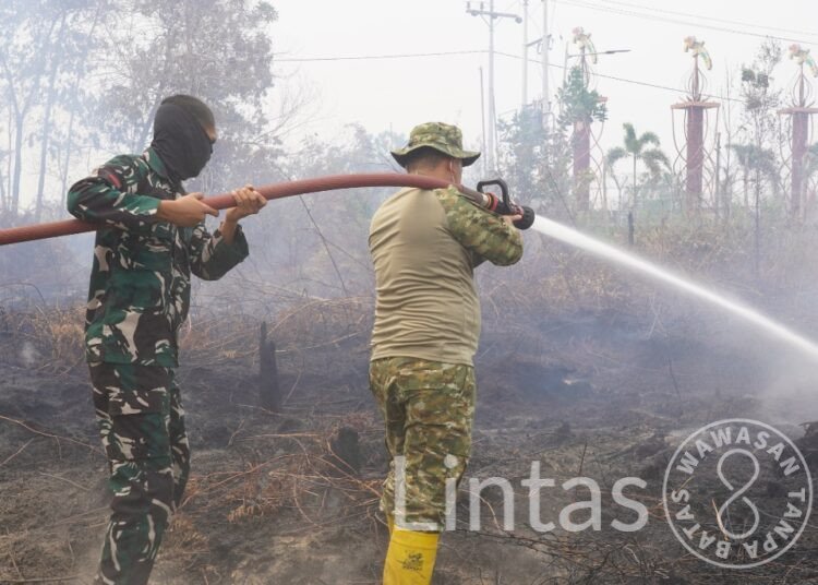 TIM SATGAS KARHUTLA KODAM XXII/TAMBUN BUNGAI TERUS LAKUKAN PENDINGINAN DI HIU PUTIH JEKAN RAYA